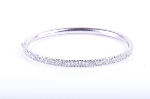 Lot 863 - Tiffany & Co. An 18ct white gold and diamond...