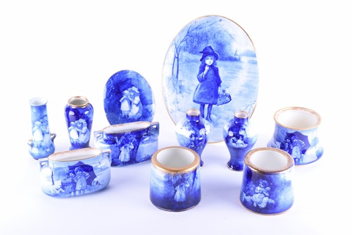 Lot 409 - A collection of Royal Doulton blue children...