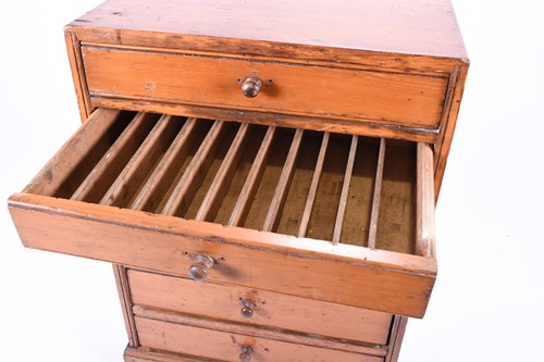 Lot 110 - A late 19th century pine six drawer collectors...