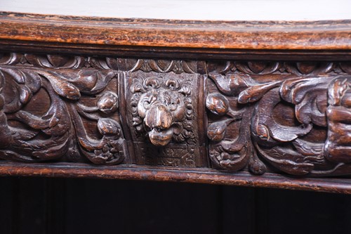 Lot 179 - An early 19th century carved oak console table,...