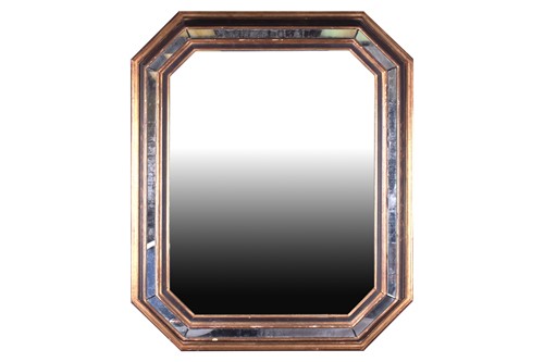 Lot 104 - A 20th century octagonal wall mirror with gilt...