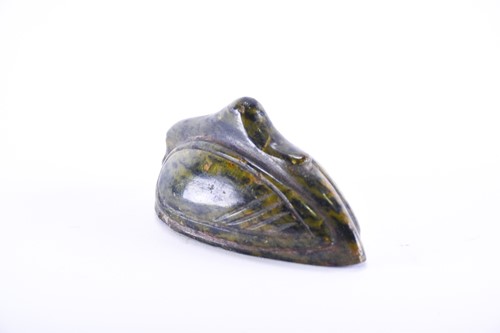 Lot 203 - A carved green marble duck, carved with its...