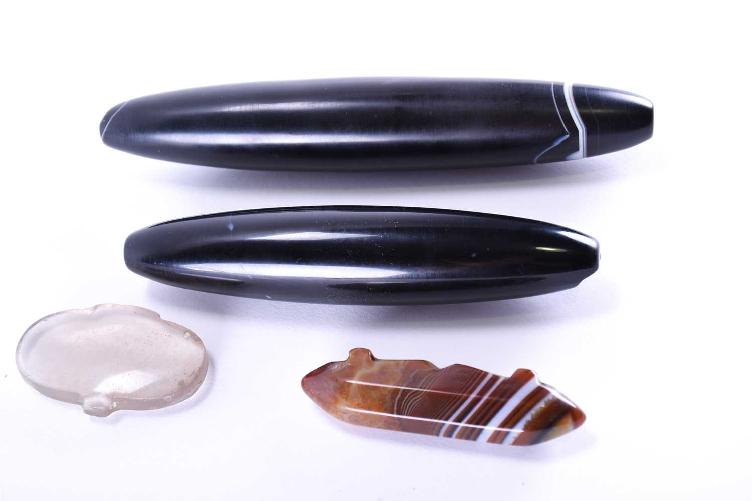 Lot 185 - Two large polished agate oval pendants,...