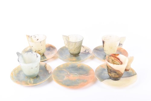Lot 131 - Five Chinese carved soapstone cups with six...