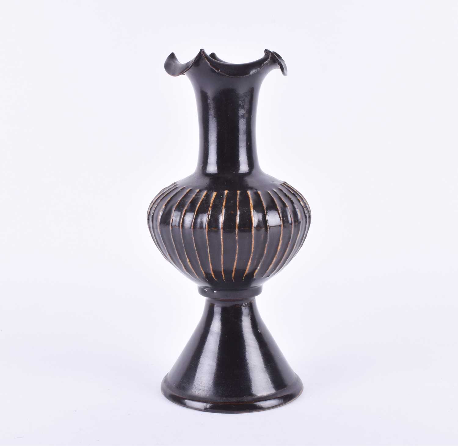 Lot 219 - A Song dynasty inspired brown glazed vase,...
