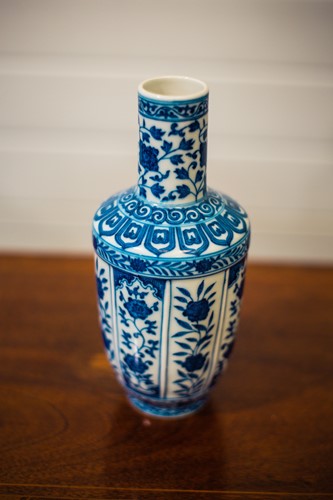 Lot 168 - A Chinese blue and white vase, the straight...