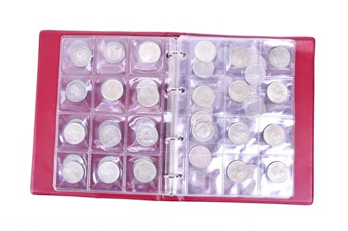 Lot 423 - A collection of silver and other coins to...