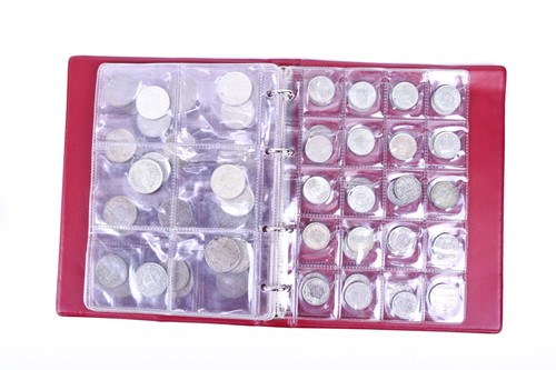 Lot 423 - A collection of silver and other coins to...