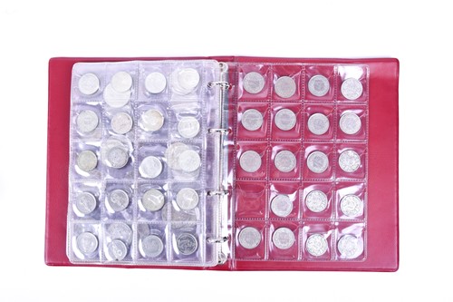 Lot 423 - A collection of silver and other coins to...
