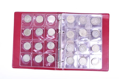 Lot 423 - A collection of silver and other coins to...
