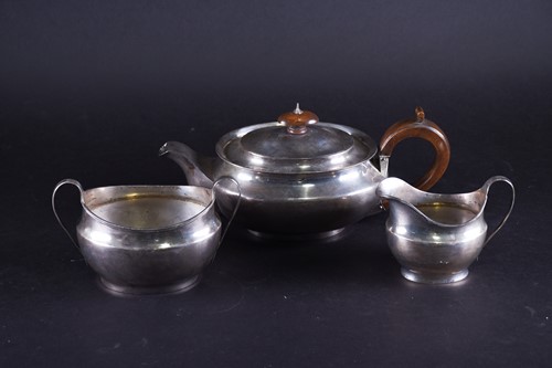 Lot 475 - A George V silver three-piece silver tea set,...