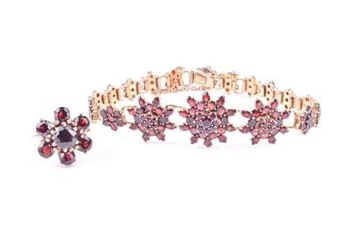 Lot 703 - A gilt metal and garnet floral cluster...