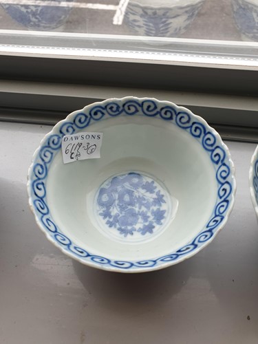 Lot 148 - A Kangxi petal moulded blue and white bowl,...