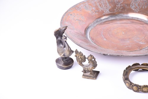 Lot 214 - A Tibetan cast bronze oil lamp, hentha weights,...