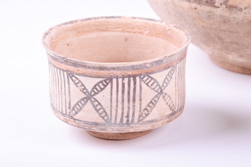 Lot 244 - Antiquities: two circular pottery bowls,...