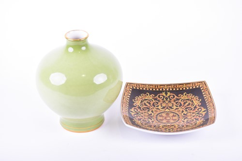 Lot 239 - An early 20th century Sevres green glazed vase...