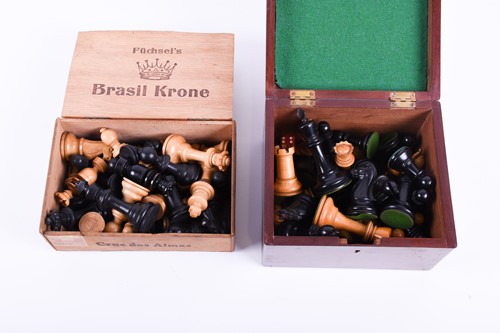 Lot 324 - A Staunton carved wood chess set, the rooks...