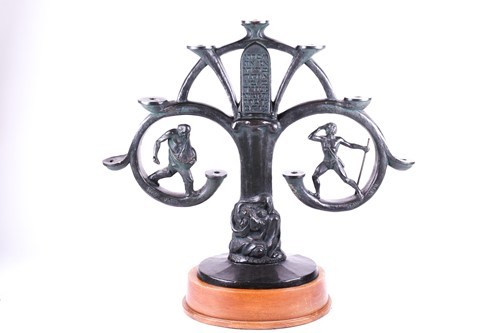 Lot 497 - A bronze figural menorah of imposing...