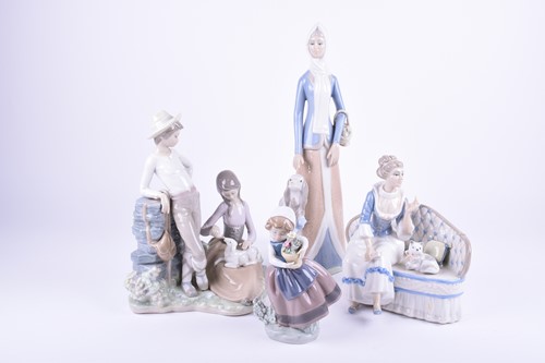 Lot 220 - Two Lladro figures comprising a young...