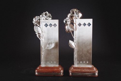 Lot 453 - Two late 20th century silver ingot-shaped...
