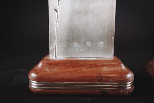 Lot 453 - Two late 20th century silver ingot-shaped...