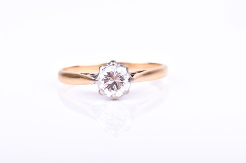 Lot 611 - An 18ct yellow gold and solitaire diamond ring,...