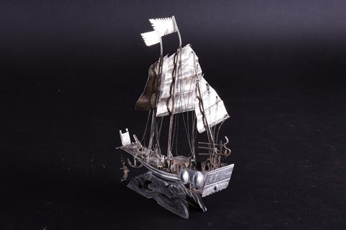 Lot 114 - A Chinese silver metal armed junk, circa 1900,...
