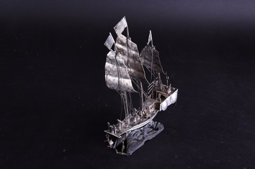 Lot 114 - A Chinese silver metal armed junk, circa 1900,...