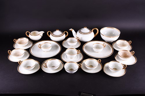 Lot 216 - An early 19th century Swansea white and gilt...