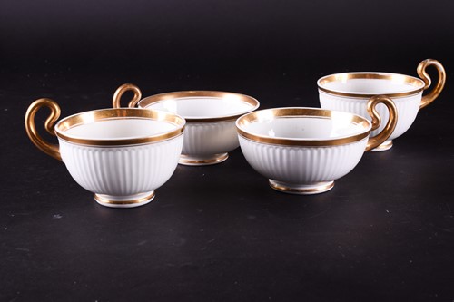 Lot 216 - An early 19th century Swansea white and gilt...