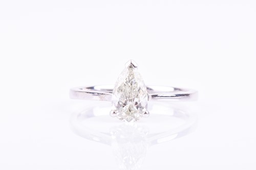 Lot 560 - An 18ct white gold and diamond ring set with a...