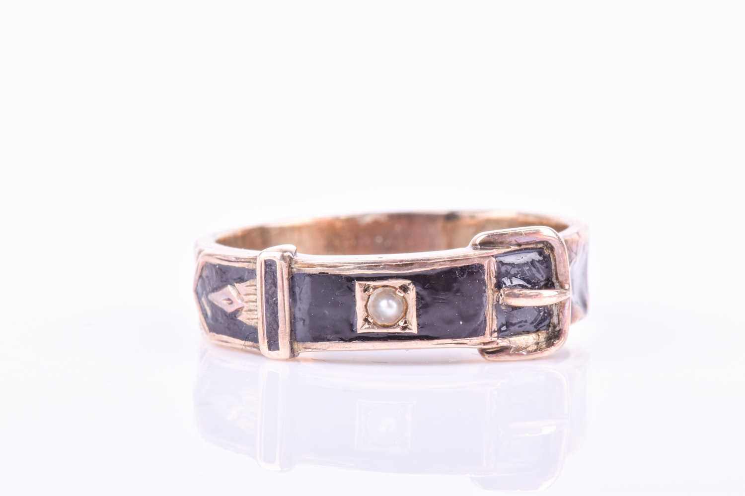 Lot 814 - A Victorian 9ct rose gold and black enamel...