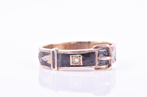 Lot 814 - A Victorian 9ct rose gold and black enamel...