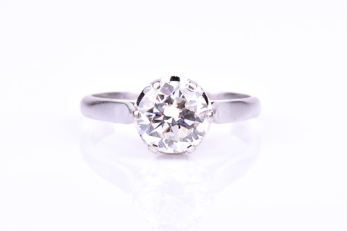 Lot 636 - An 18ct white gold and solitaire diamond...