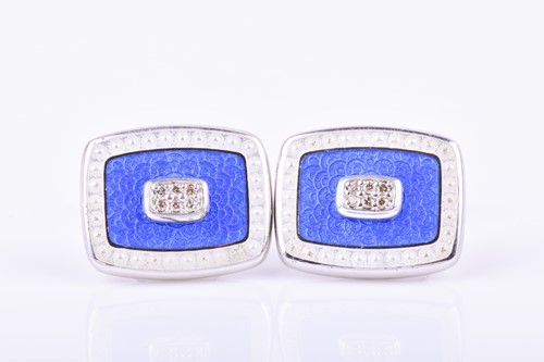 Lot 690 - A pair of silver, diamond, and enamel...