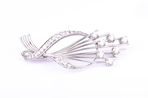 Lot 585 - An 18ct white gold and diamond spray brooch,...