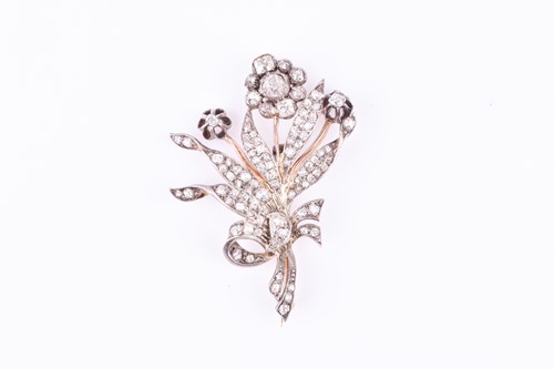 Lot 682 - A Victorian diamond floral spray brooch set...