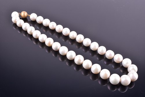 Lot 773 - A cultured pearl necklace comprised of rounded...