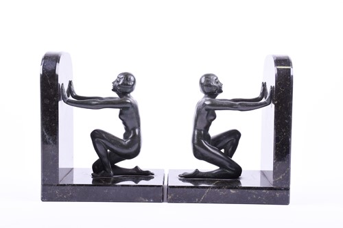 Lot 308 - A pair of Art Deco style patinated spelter...