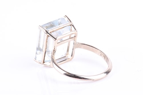 Lot 511 - A pale blue gemstone cocktail ring possibly...