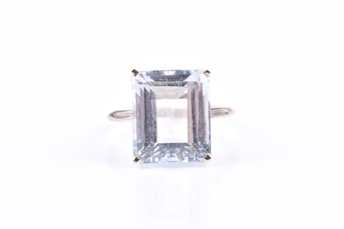 Lot 511 - A pale blue gemstone cocktail ring possibly...