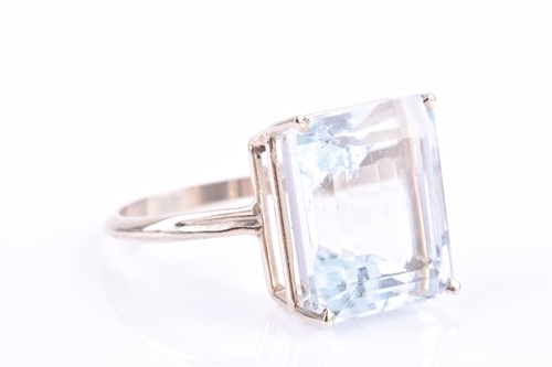 Lot 511 - A pale blue gemstone cocktail ring possibly...