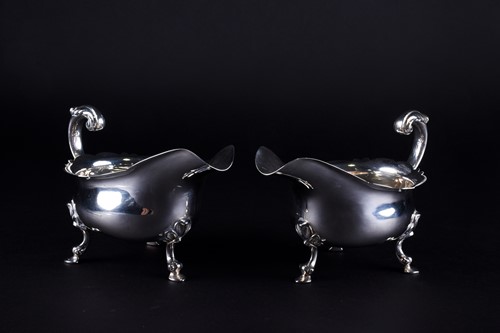 Lot 438 - A pair of Georgian style silver sauce boats,...