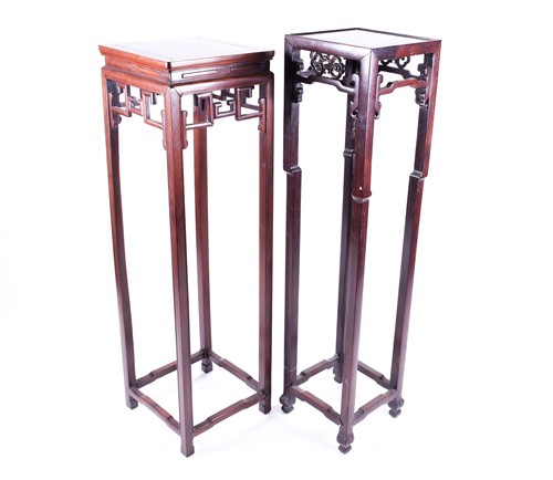 Lot 162 - Two Chinese hardwood tall urn stands, with...