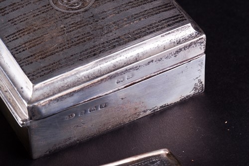 Lot 440 - Two silver cigarette boxes, each with cedar...