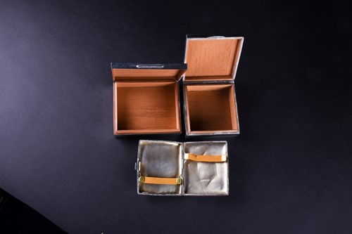Lot 440 - Two silver cigarette boxes, each with cedar...