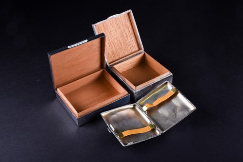 Lot 440 - Two silver cigarette boxes, each with cedar...