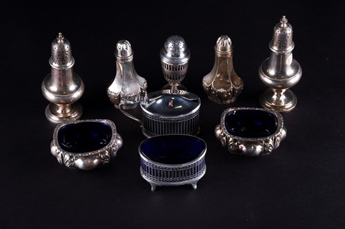 Lot 449 - A collection of silver cruets, salts and...