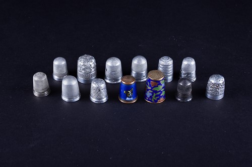 Lot 464 - A collection of assorted thimbles, to include...