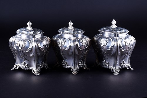 Lot 469 - A set of three early George III silver tea...